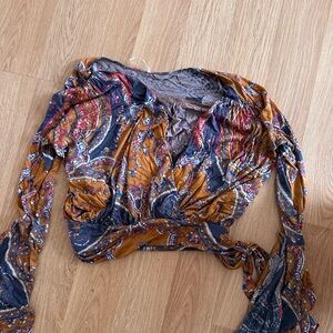 Free people bell sleeved top.